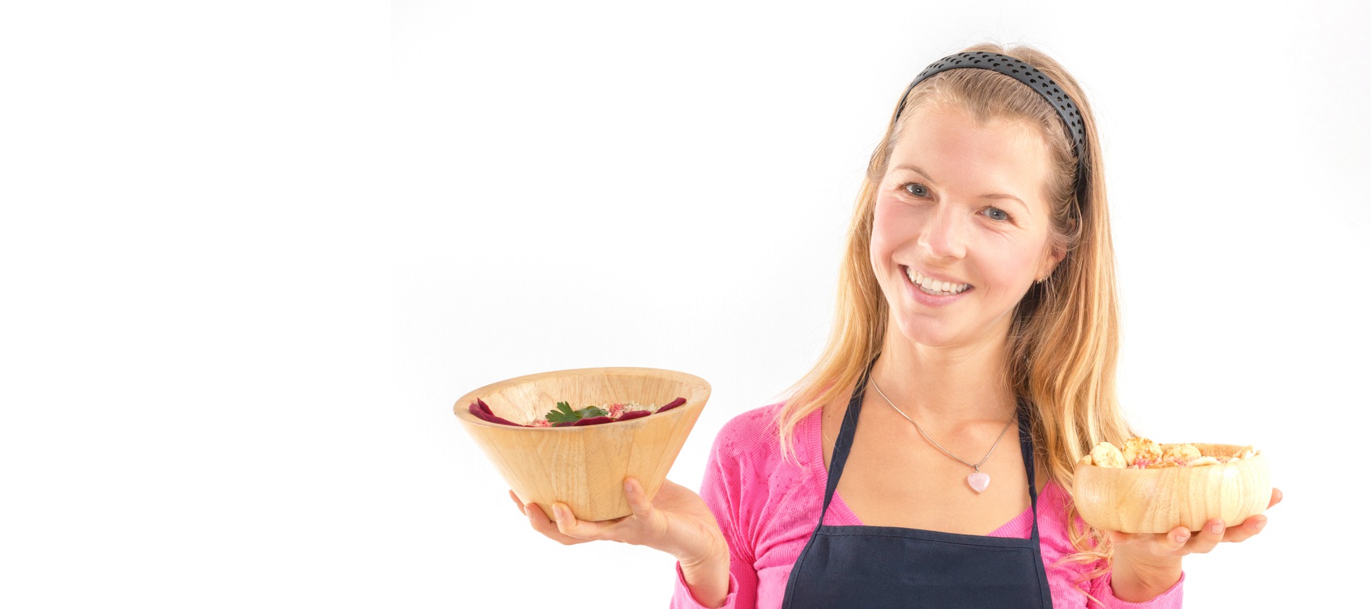 Student smiling with a finished dish